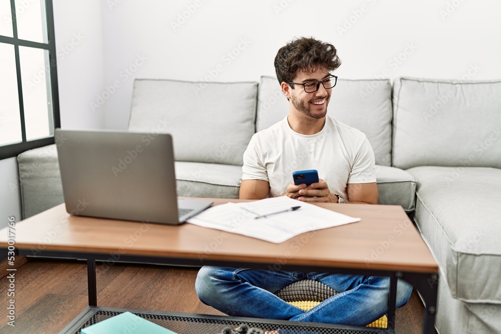 Young hispanic man smiling confident working at home Young hispanic man smiling confident working at home