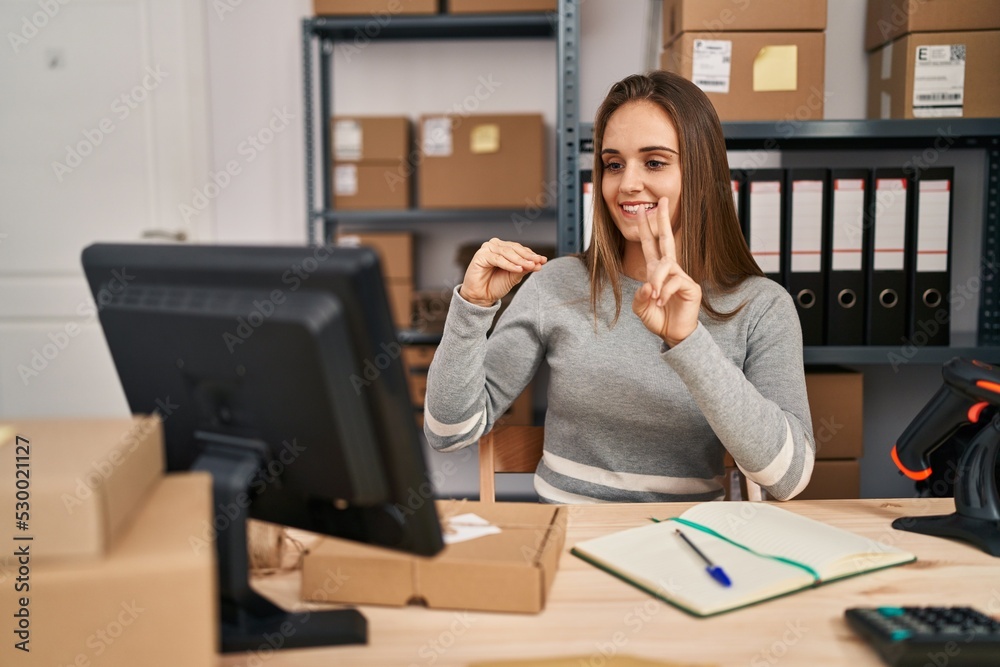 Young blonde woman ecommerce business worker having online deaf language conversation at office Young blonde woman ecommerce business worker having online deaf language conversation at office