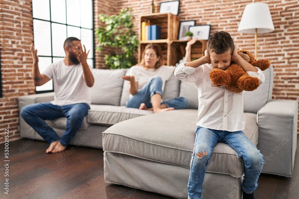 Fototapeta premium Family sitting on sofa and kid sad for partents argue at home