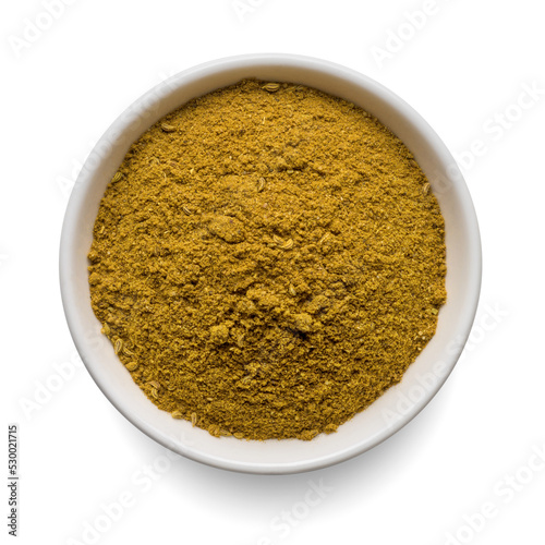 Fototapeta Naklejka Na Ścianę i Meble -  Curry powder in round bowl isolated on white. Top view.