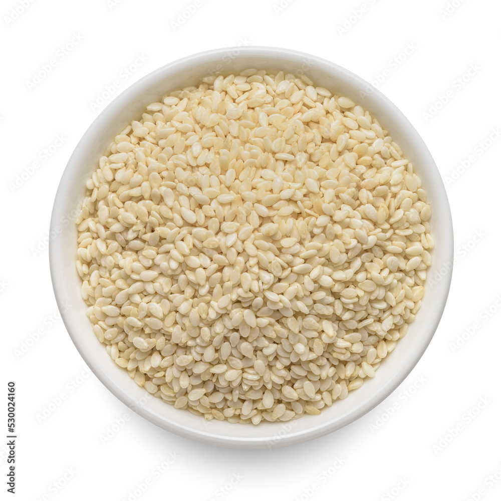 Sesame seeds in round bowl isolated on white. Top view. Sesame seeds in round bowl isolated on white. Top view.