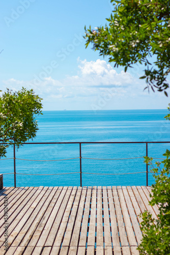 Obraz na płótnie view of the blue sea from the wooden veranda