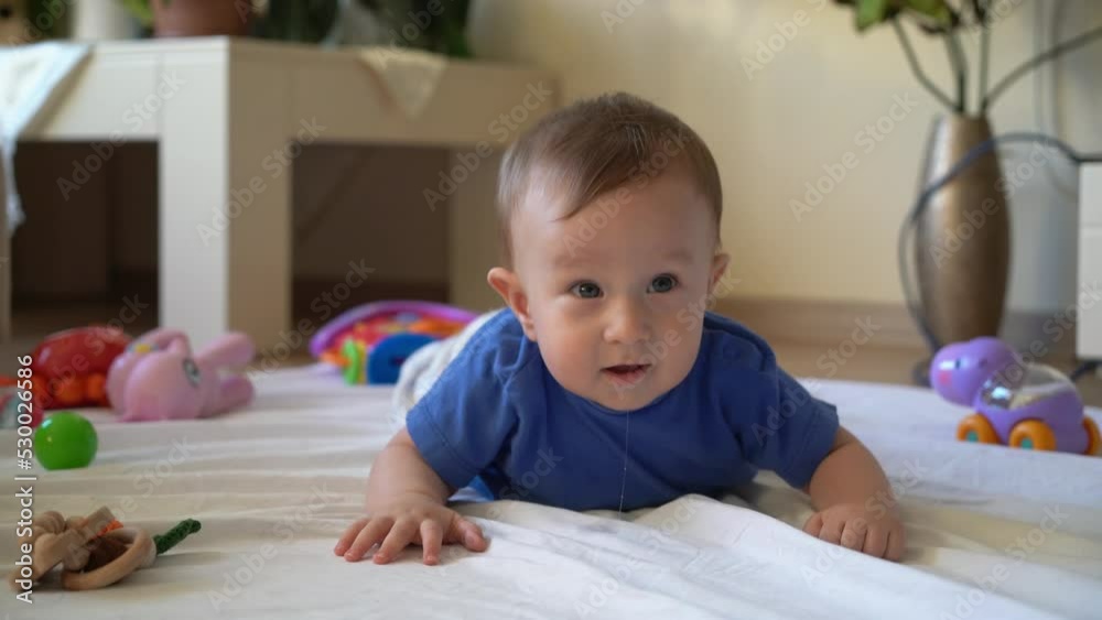 Baby crawling and smiling. He slobbers a little. Baby crawling and smiling. He slobbers a little.