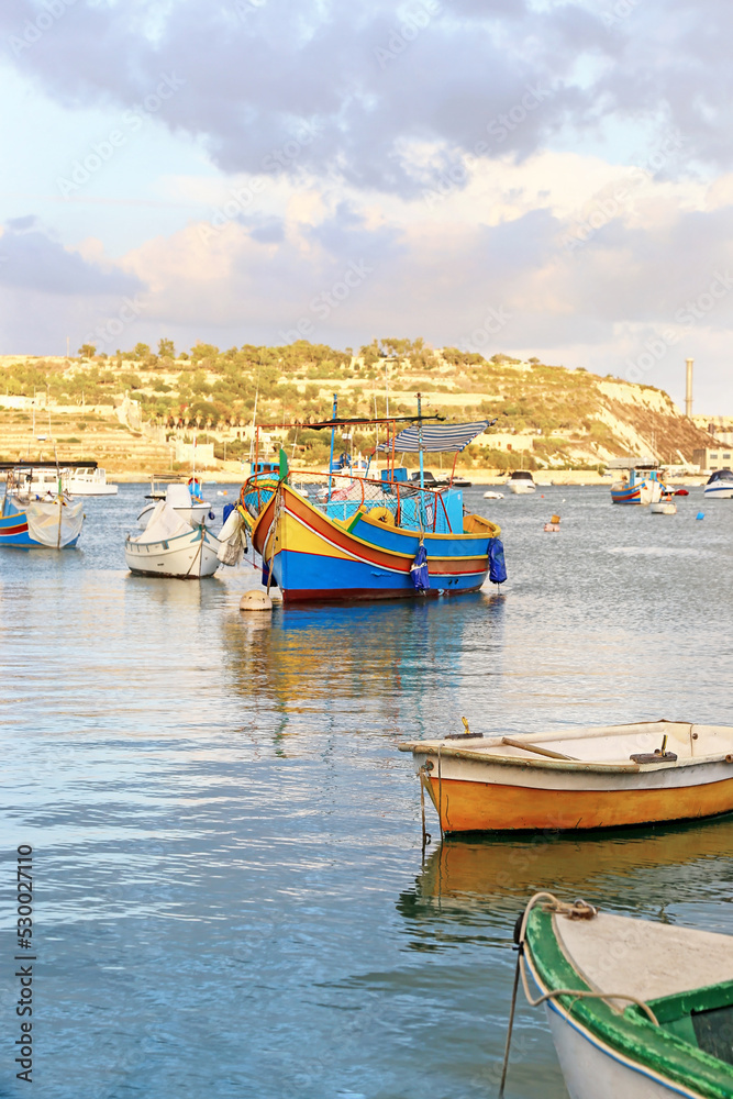 traditional colorful fishing boats at Marsaxlokk village Malta