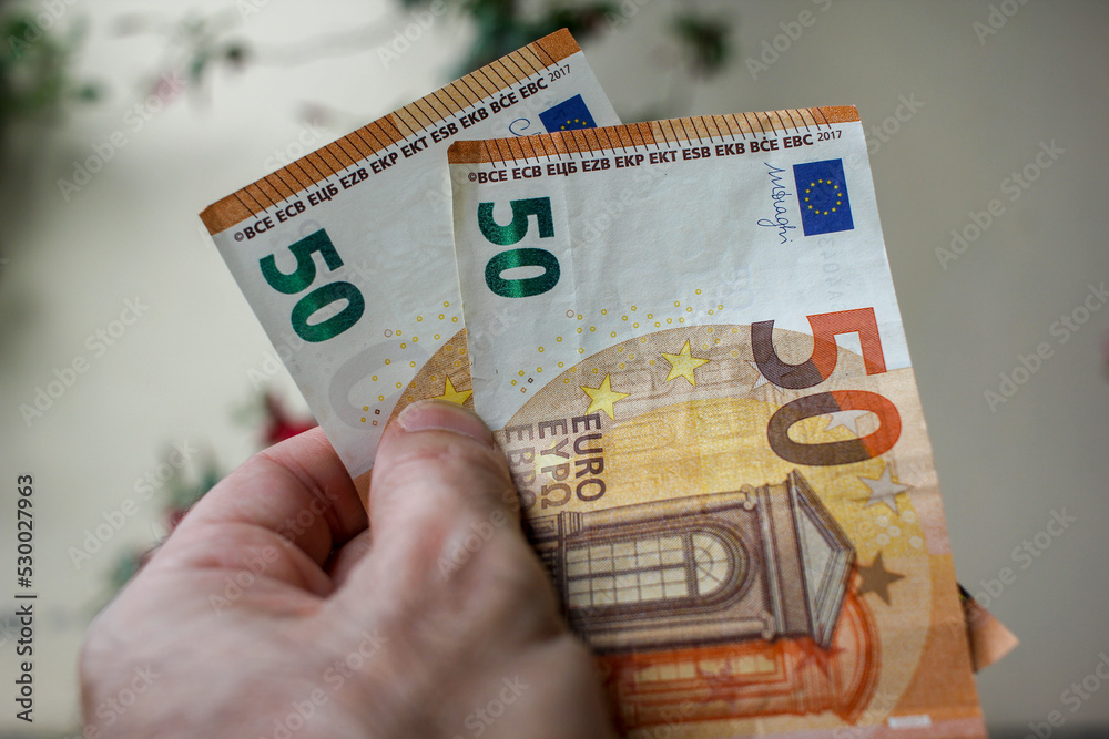 two euro banknotes in my left hand