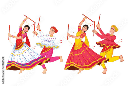 Dancing Dandiya couple at Navratri, Happy Durga Puja and Dussehra