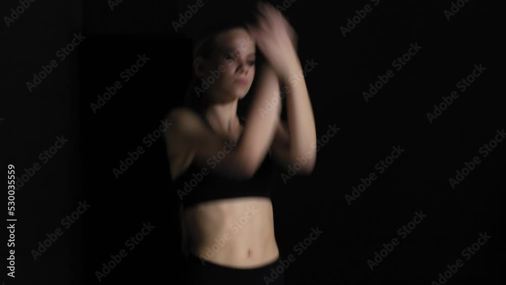 Energetic Young Woman Choreographer Dancing Alone in Studio Energetic Young Woman Choreographer Dancing Alone in Studio