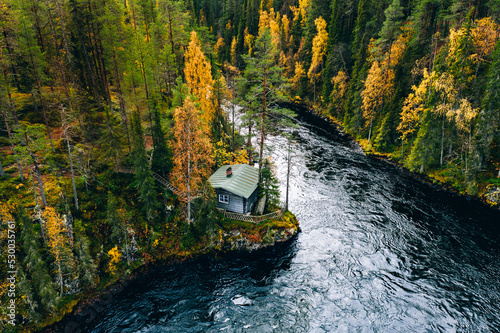 Aerial view of fall woods with blue river.  Oulanka National Park, Finland. photo