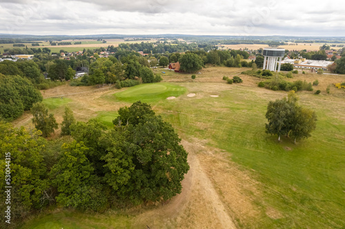 Sweden  Knislinge     September 10  2022  Aerial view of a little village  golf course  green field