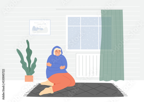 Woman shivers at home near the cold battery. Winter is outside the window, cold and snowy season. Economy and financial crisis concept. Female in hoodie freezes. Vector illustration, simple interior.