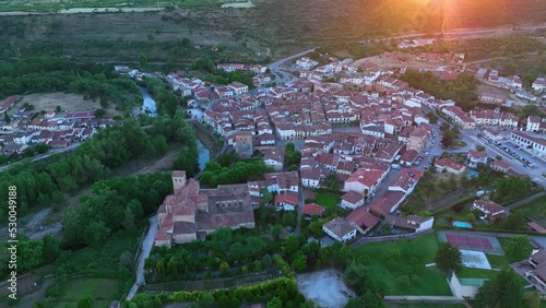 Aerial view from a drone at sunset in the surroundings of the town of Covarrubias. Arlanza region. Burgos, Castilla y Leon, Spain, Europe photo