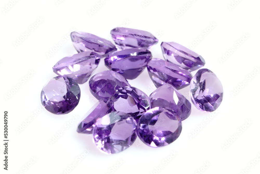 Natural gemstone purple amethyst on white background Natural gemstone purple amethyst on white background