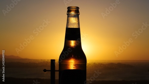beer bottle on sunset