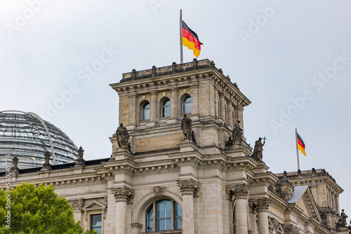 The federal flag in front of the Reichstag worth seeing in Berlin, Germany