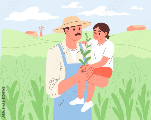 Farmer with daughter in arms in field