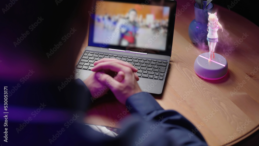 Φωτογραφία Person watch movie on laptop with 3D anime girl hologram beside interacting