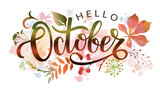 Hello October. Handwritten lettering with autumn leaves. Word for typography, postcard, calendar, monthly organizer.