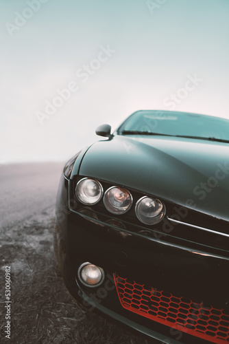 Close up Black Car Lamps with Foggy weather, Street © Alex