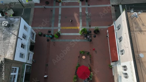 Downtown Mall in Charlottesville Virginia. Popular tourist attraction is outdoor pedestrian walkway with stores, restaurants, and civic attractions. Aerial. photo