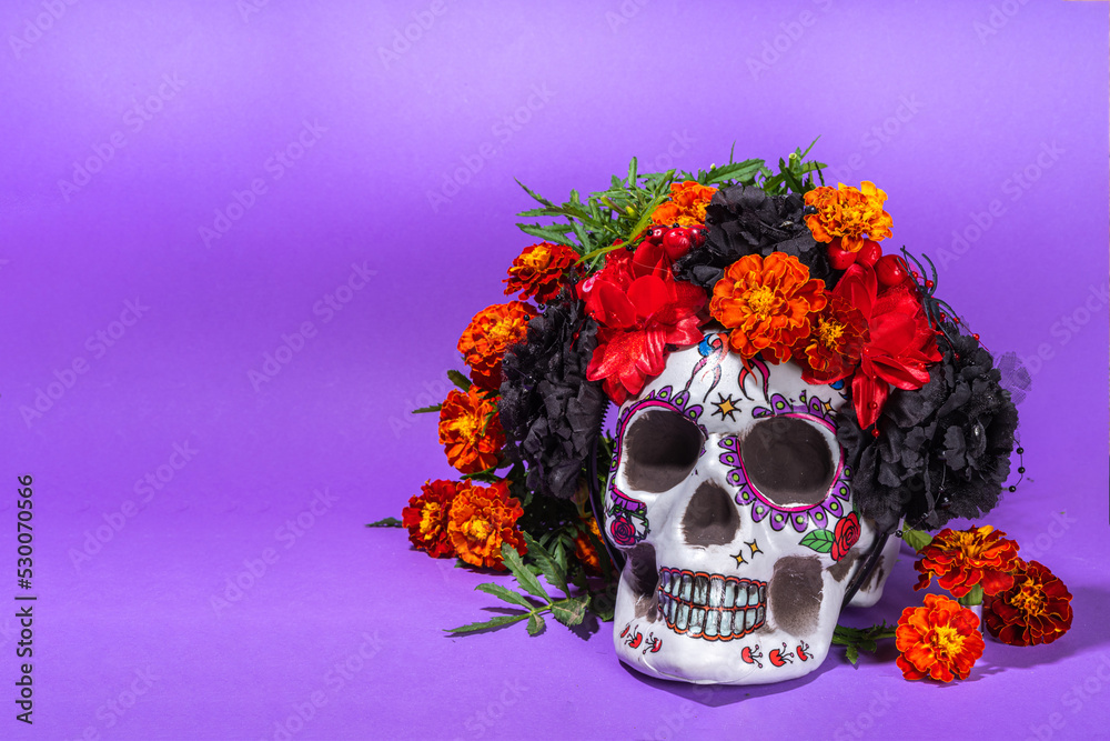 Spanish Mexican traditional holiday, autumn festival Day of the Dead (dia de los muertos) background. With traditional Pan de Muerto bread, decorations and marigold and cempasuchil flowers Spanish Mexican traditional holiday, autumn festival Day of the Dead (dia de los muertos) background. With traditional Pan de Muerto bread, decorations and marigold and cempasuchil flowers