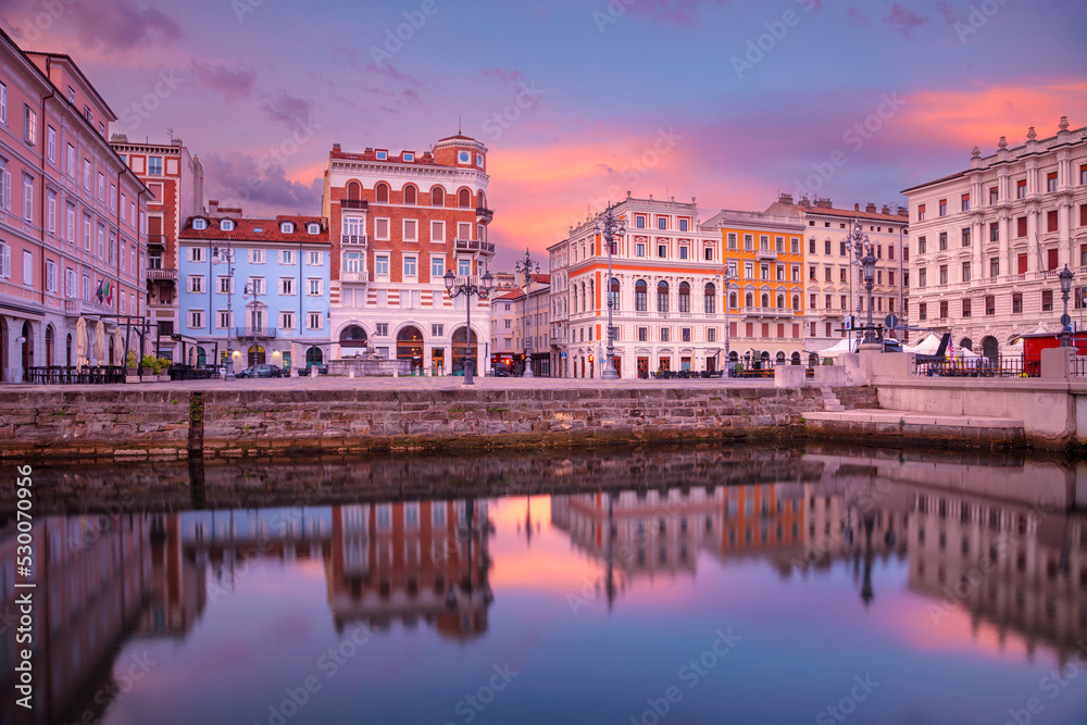 Trieste, Italy. Cityscape image of downtown Trieste, Italy at sunrise.