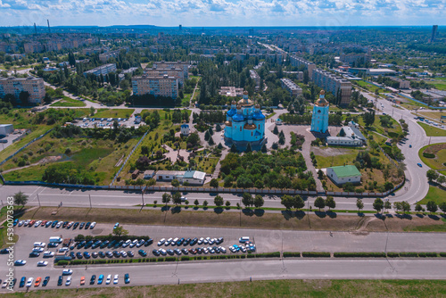 Spaso-Preobrazhensky Cathedral against the blue sky. Ukraine, Krivoy Rog. Aerial view from a drone. Urban landscape. City center panorama photo