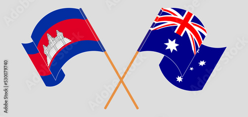 Crossed and waving flags of Cambodia and Australia