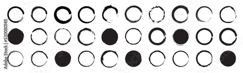 Grunge circle brush icon. Set different circle brush strokes. Set of black grunge circles shapes on a white background. Paint brush stamp collection. Hand drawn paint brush circle logo frame