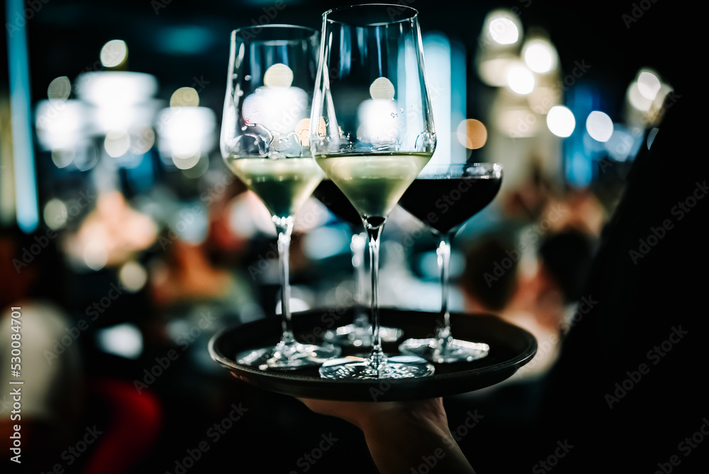 alcohol cocktail and wine set on a waiter tray in bar alcohol cocktail and wine set on a waiter tray in bar