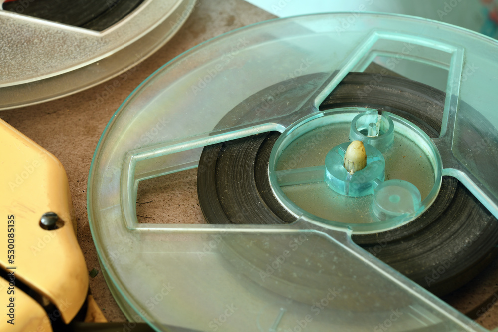 Old vintage reeltoreel player. Tape recorder with spools. Bobbin tape
