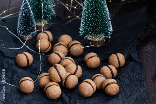 Obraz na płótnie Lady's kisses, traditional Italian nut cookies with coffee and chocolate filling. w salonie