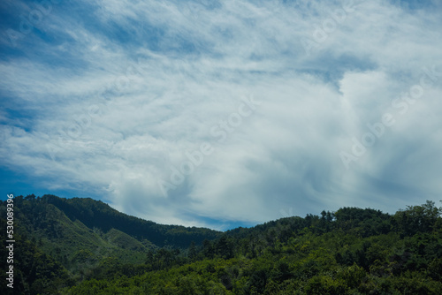 Mountains, sky and clouds passing by during travel © Sepe44