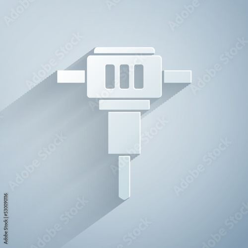 Paper cut Construction jackhammer icon isolated on grey background. Paper art style. Vector