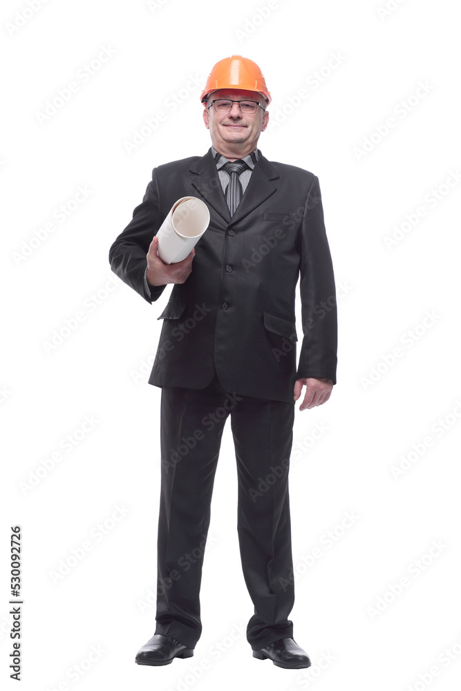 An architect wearing a hard hat and holding plans An architect wearing a hard hat and holding plans