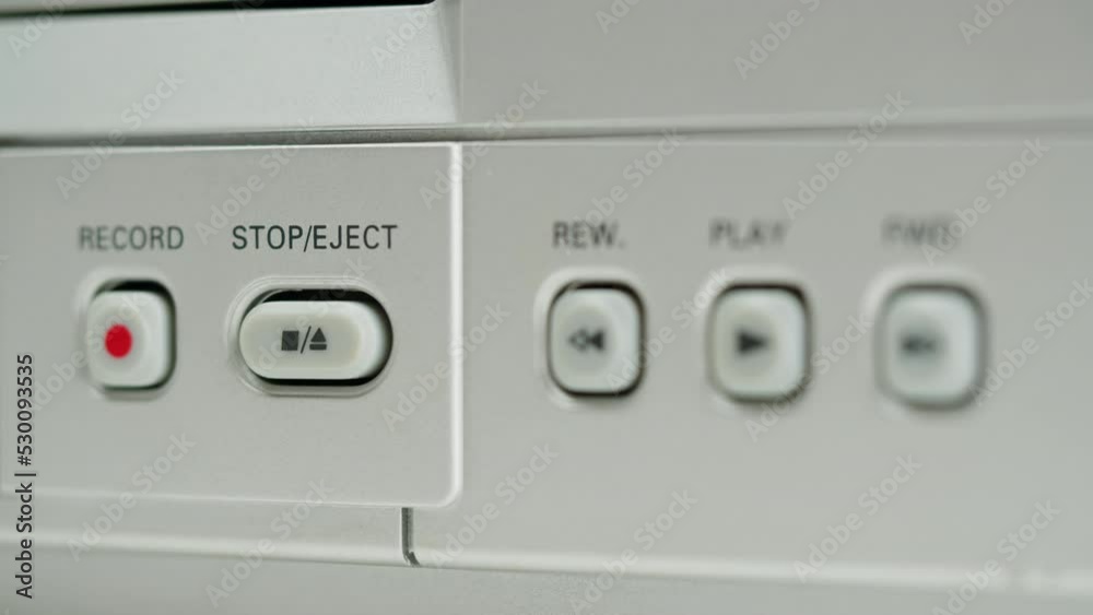 Old video recorder close-up, VHS. Retro player, vintage video cassette broadcasting, audio tape. Old video recorder close-up, VHS. Retro player, vintage video cassette broadcasting, audio tape.