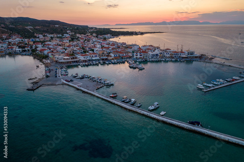 Aerial view of Elafonisos main village during sunset. Located in south Peloponnese Elafonisos is a small island very famous for the paradise sandy beaches and the turquoise waters.