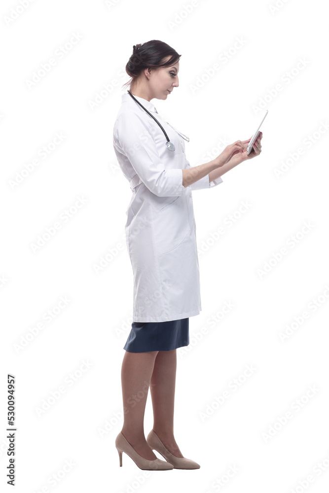 in full growth. female doctor with a digital tablet. in full growth. female doctor with a digital tablet.