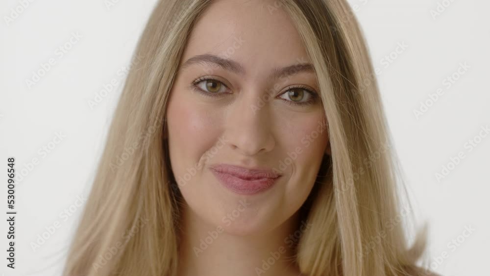 Beauty Woman face Portrait. Beautiful Spa model Girl with Perfect Fresh Clean Skin. Caucasian Female with Blonde hair looking at camera and start smiling. Youth and Skin Care Concept. Isolated on a Beauty Woman face Portrait. Beautiful Spa model Girl with Perfect Fresh Clean Skin. Caucasian Female with Blonde hair looking at camera and start smiling. Youth and Skin Care Concept. Isolated on a