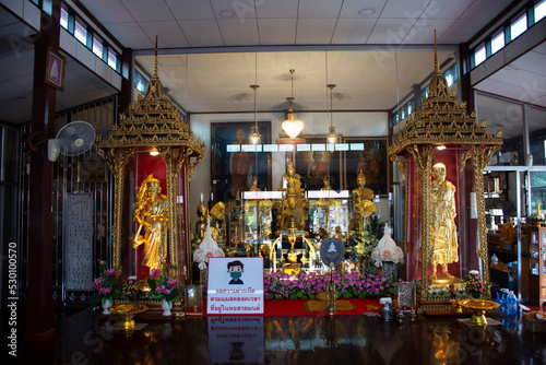 Buddha statue and Luang Pu Doo monk statues for thai people travelers travel visit and respect praying blessing with worship holy mystery at Wat Sakae Temple on August 31, 2022 in Ayutthaya, Thailand © tuayai