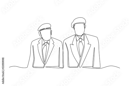 One continuous line drawing of two veteran with beret on his head. Veterans day concept. Single line draw design vector graphic illustration.