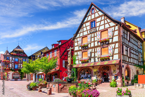 Kaysersberg Vignoble, France. Picturesque street with traditional half timbered houses on the Alsace Wine Route. photo