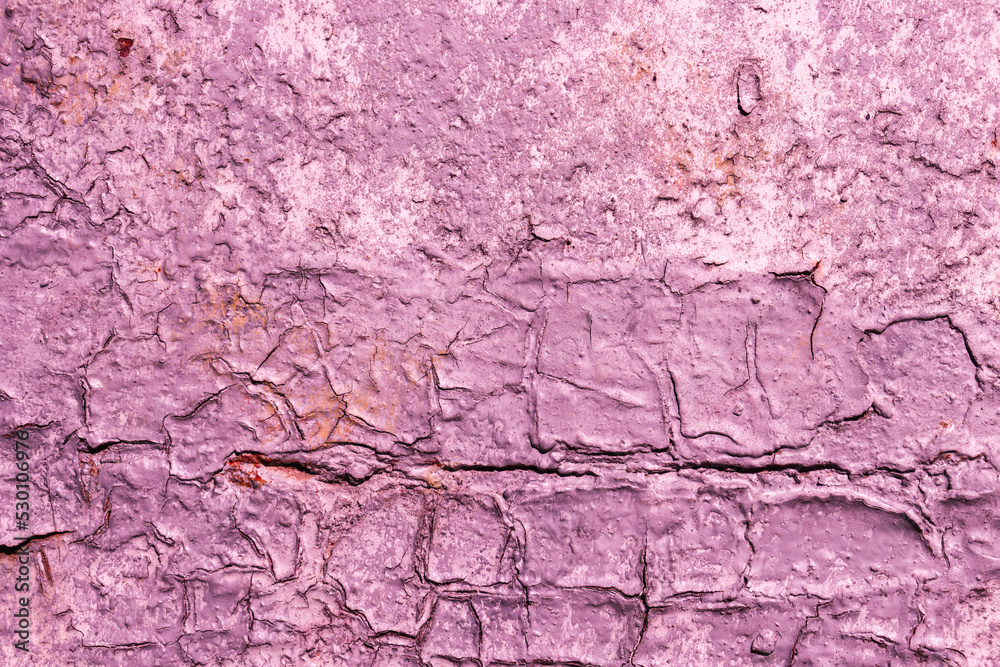 Obraz premium Abstract background of old damaged purple paint on the wall.