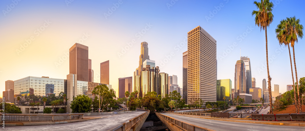 the skyline of los angeles during sunrise