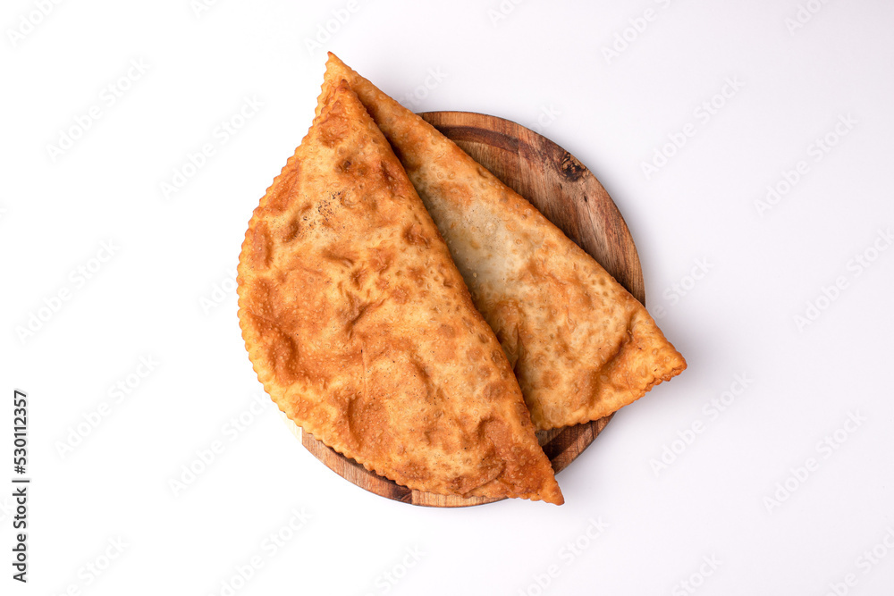Cheburek, pasties with meat, food on a white background, isolated