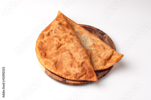 Cheburek, pasties with meat, food on a white background, isolated