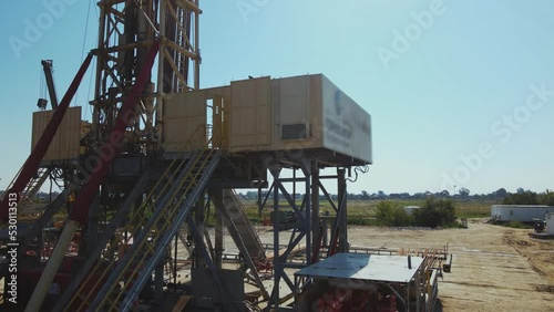 Horizontal view of tower. Drone footage. Warehouses, industrial concept. Pipeline, pollution, stairs, store, structure, natural, reservoir, manufacturing, petrochemical, economy, engineer