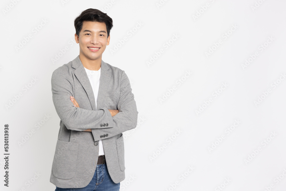 Young Asian businessman smilling with arms crossed isolated on white background Young Asian businessman smilling with arms crossed isolated on white background
