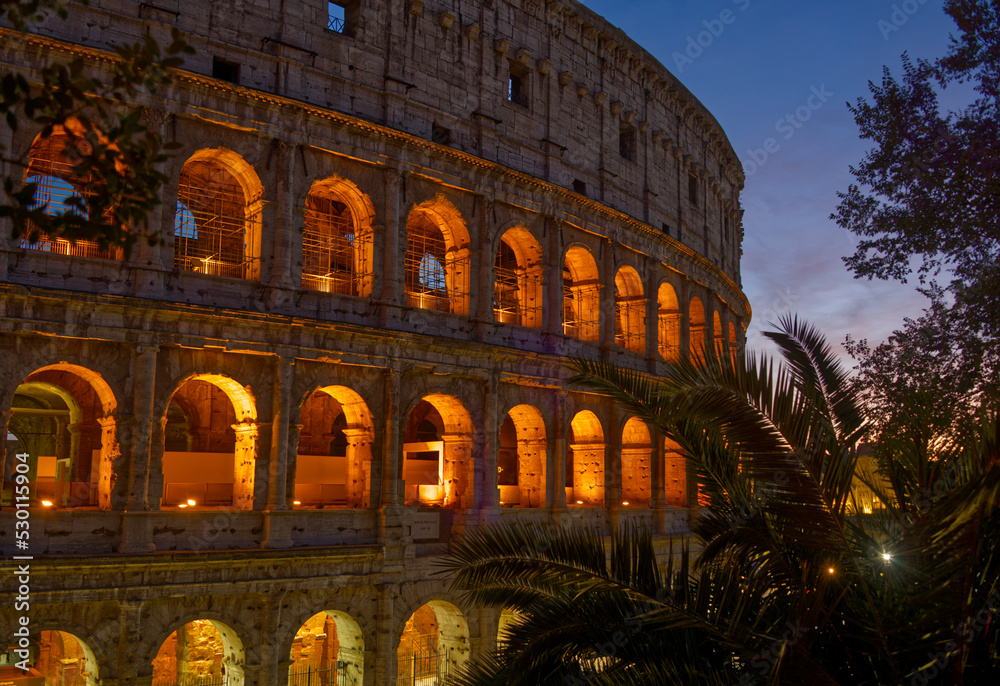 The  Colosseum located in Rome Italy is an oval amphitheater in the centre of the city. It is the largest ancient amphitheater ever built.