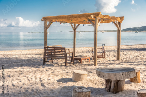 table and chairs on the beach