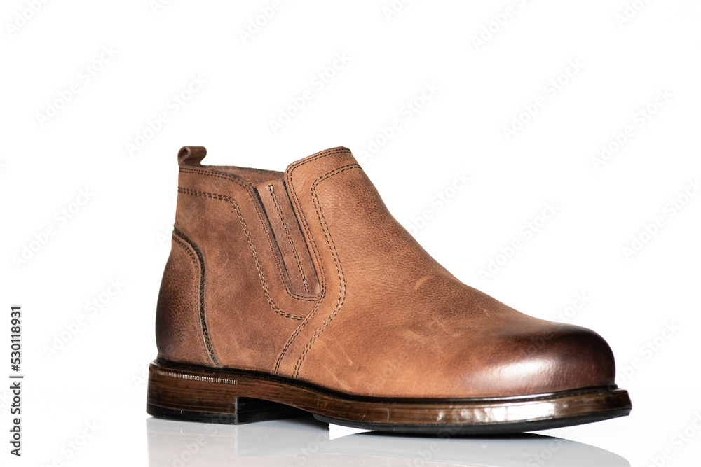 Men's autumn boots made of brown genuine leather isolated on a white background.